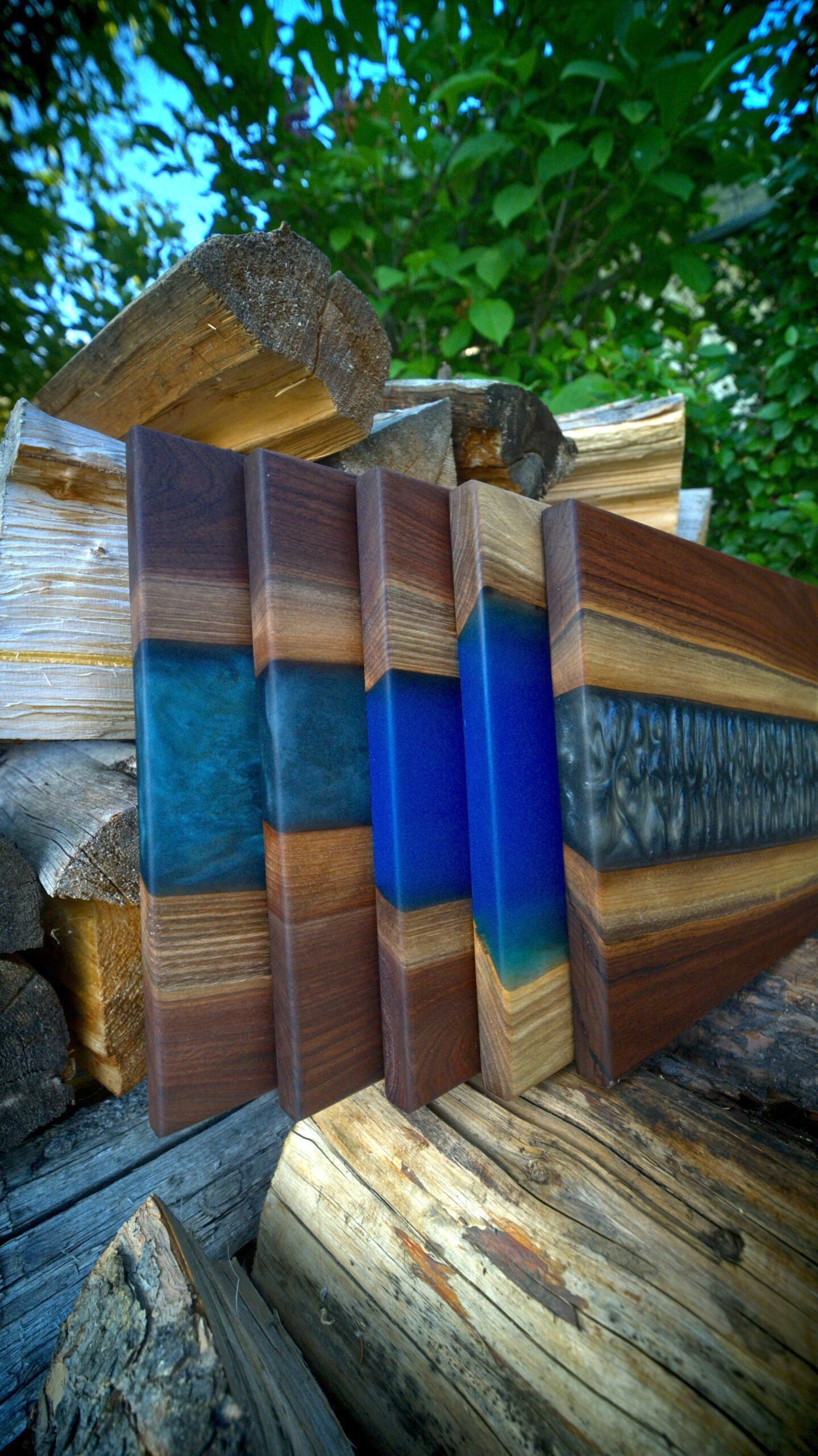 Unique Wood Cutting Boards & Furniture Made for your Home Hero image of a stack of river boards